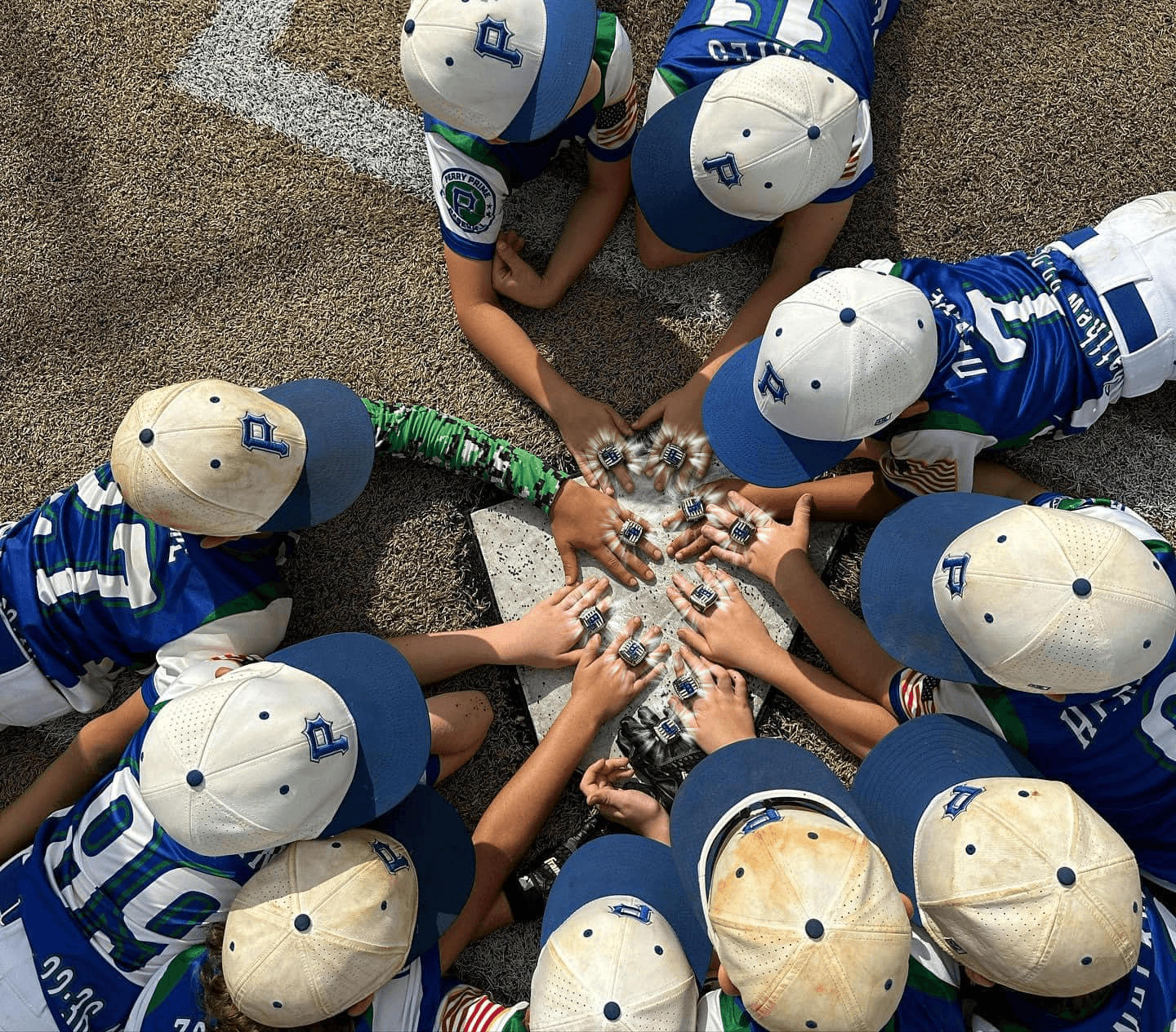 The team celebrating at home plate